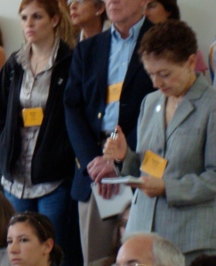 Valerie Wiener (BJ ’71, MA ’72) takes notes during the "Religion and Politics" forum Thursday morning.